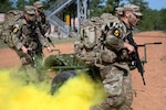 Soldiers representing the Army National Guard evacuate a simulated casualty during the 2023 U.S. Army Best Squad Competition at Fort Stewart, Georgia, Oct. 2, 2023. Twelve squads from throughout the Army competed to be named the Army’s Best Squad, and for individual Soldiers to earn the title Soldier or Noncommissioned Officer of the Year.