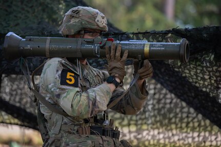 Staff Sgt. James Varley, representing the Army National Guard, prepares to conduct a functions check on the AT-4 anti-armor weapon during the 2023 U.S. Army Best Squad Competition at Fort Stewart, Georgia, Sept. 29, 2023. The Soldiers competing for the Best Squad comprised teams from various units and military occupational specialties from across the Army.