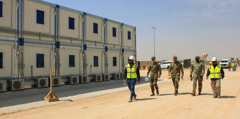 U.S. Army Command Sgt. Maj. Clifton D. Morehouse, U.S. Army Corps of Engineers Transatlantic Division senior enlisted advisor (center), conducts a site visit of a modular billeting project aimed at improving the overall quality of life for military personnel stationed at Prince Sultan Air Base, Saudi Arabia, Sept. 13. (U.S. Army photo by Catherine Carroll, U.S. Army Corps of Engineers Transatlantic Division public affairs office)