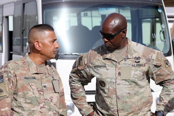 U.S. Army Col. Mohammed Z. Rahman, U.S. Army Corps of Engineers Transatlantic Expeditionary District commander (left), speaks with Army Command Sgt. Maj. Clifton D. Morehouse, Army Corps of Engineers Transatlantic Division senior enlisted advisor (right), near Erbil Air Base, Iraq, Sept. 19. (U.S. Army photo by Rick Rzepka, U.S. Army Corps of Engineers Transatlantic Expeditionary District public affairs office)