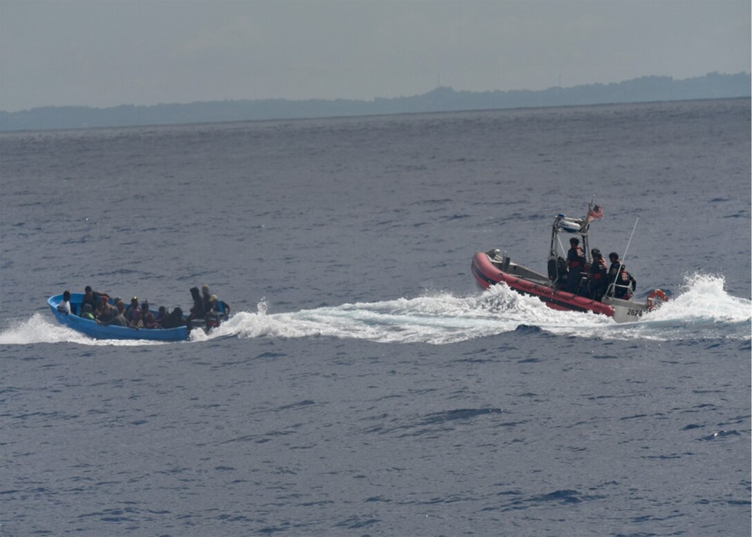 Coast Guard Cutter Joseph Napier’s cutter boat interdicts an unlawful irregular migration voyage with 21 migrants in Mona Passage waters off Aguadilla, Puerto Rico, Oct. 9, 2023.  The interdiction was carried out in conjunction with Customs and Border Protection air and surface units.  The migrants in this group were repatriated to the Dominican Republic Oct. 11, 2023. (U.S. Coast Guard photo by Ensign John H. Harris, Coast Guard Cutter Joseph Napier operations officer.)