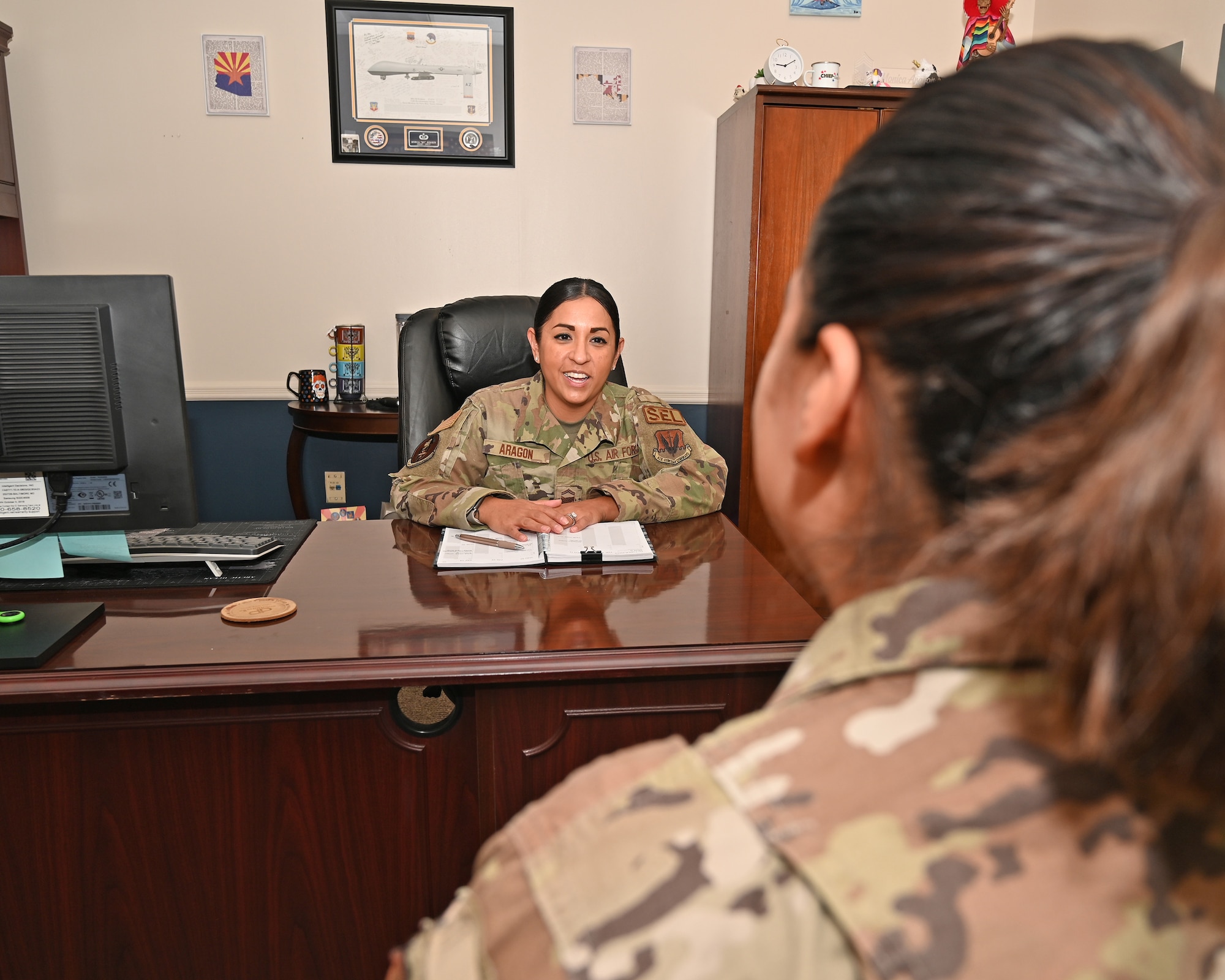 Maryland Air National Guard Senior Master Sgt. Monica Aragon, 175th Logistics Readiness Squadron senior enlisted leader, conducts a mentoring session with an Airman at Martin State Air National Guard Base, Middle River, Md., October 11, 2023.