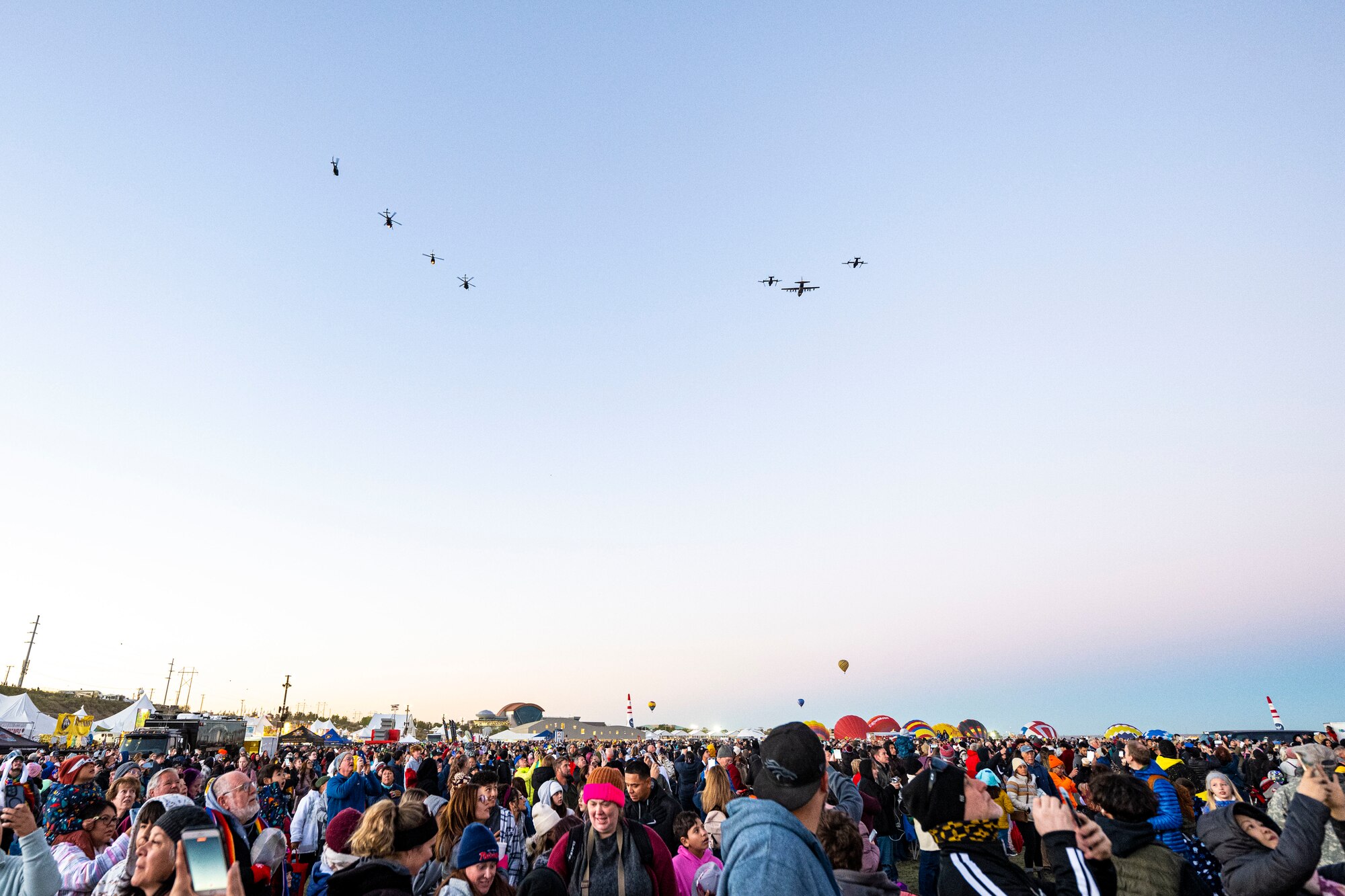 Aircraft flies over crowd