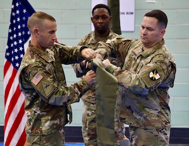 Commanding Officer Lt. Col. Jason Sabovich and Command Sgt. Maj. Chad Webber case the colors of the Cyber Training Battalion as Master Sgt. Quientin Abston holds the staff. The newly established 401st Cyber Battalion's colors were unfurled signifying the transformation of the battalion.