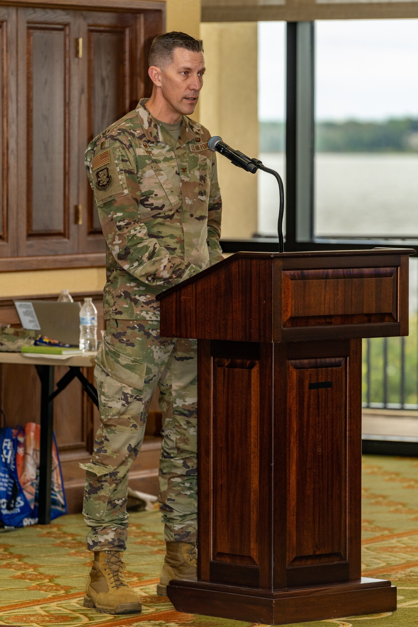 U.S. Air Force Col. Billy Pope Jr., 81st Training Wing commander, speaks to attendees of the Mississippi Cyber Initiative Summit at Keesler Air Force Base, Mississippi, Oct. 12, 2023.