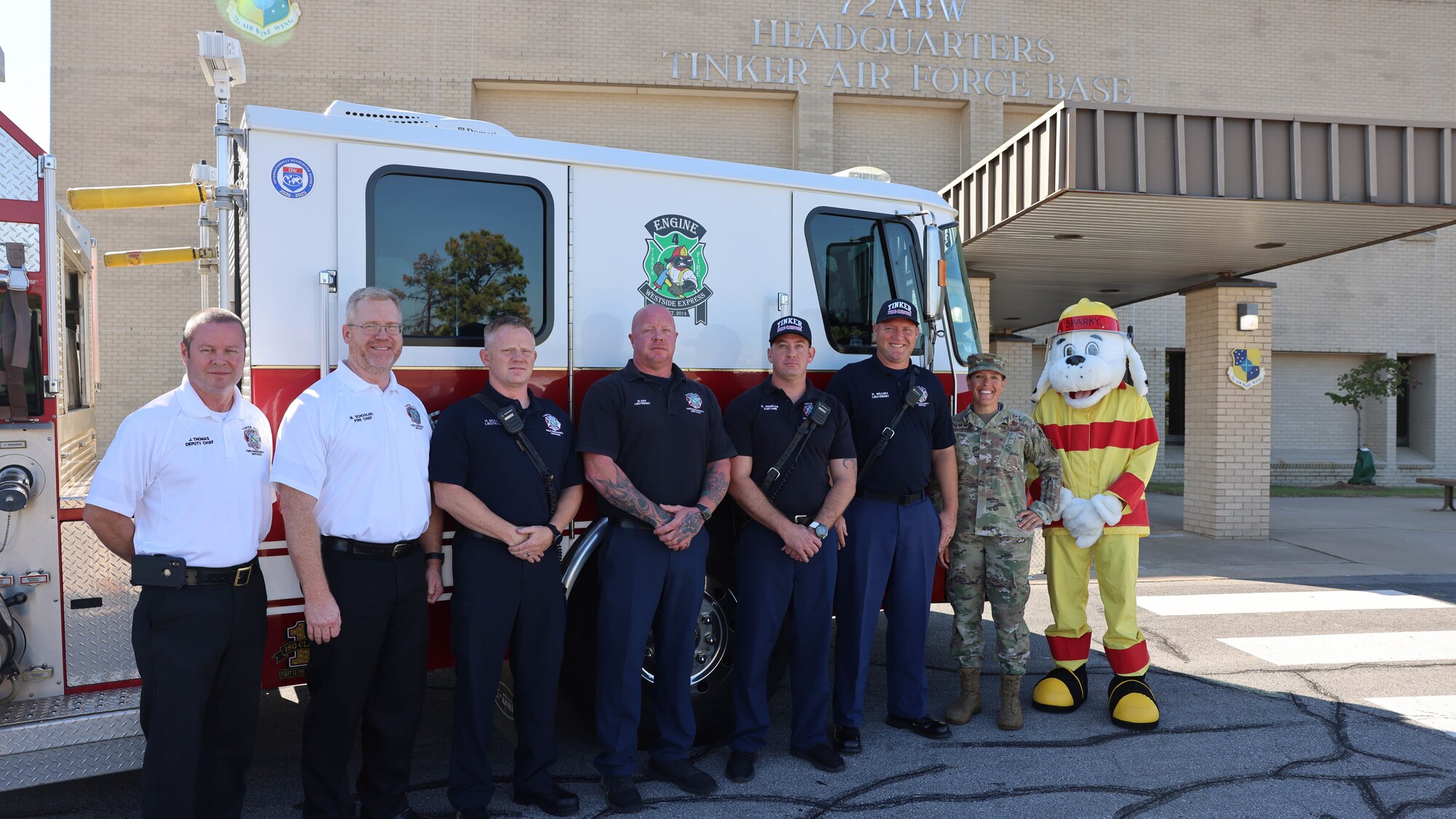 fire department poses with base leadership