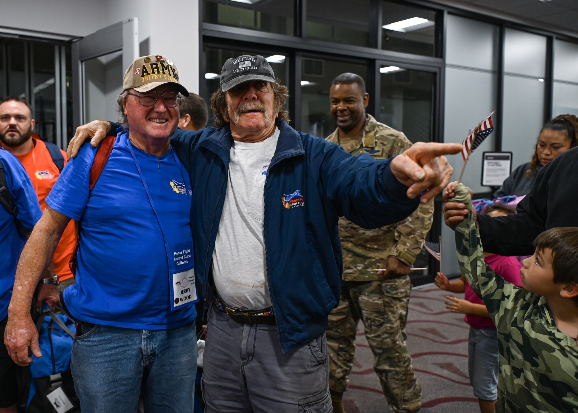 A Veteran and his family pose for a photo.