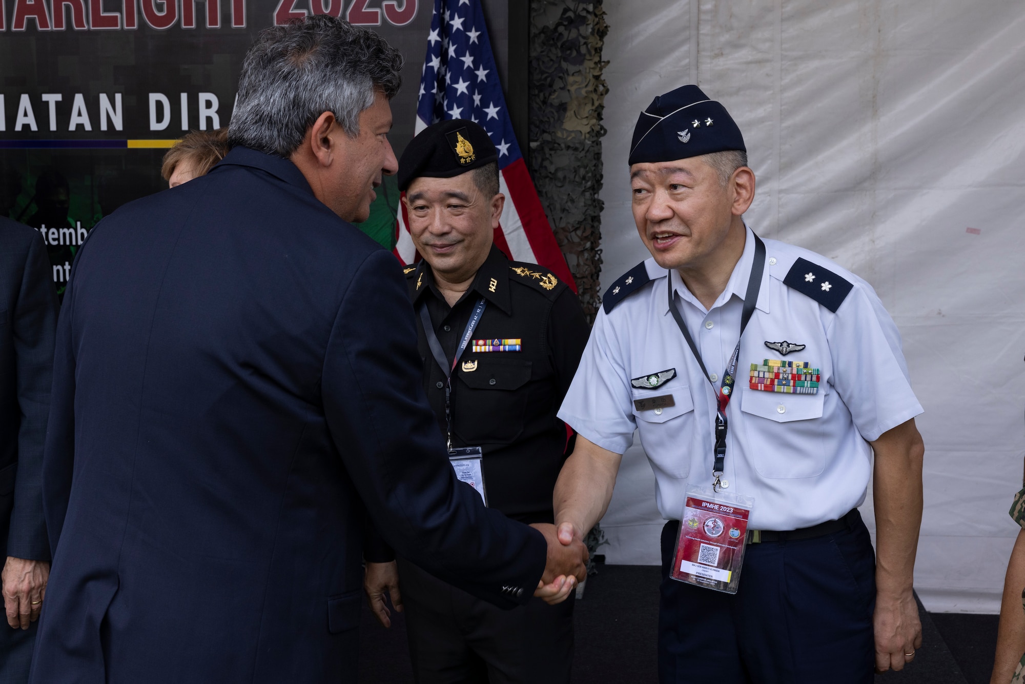 U.S. Charge d’affaires, a.i. Manu Bhalla, the deputy chief of mission at U.S. Embassy Malaysia, greets Japan Air Self-Defense Force Surgeon General of the Air Staff Office Maj. Gen. Naruo Kuwada, before doing officiating the handover of two mobile Role 2 surgical/critical care systems, and a Role 3 field hospital from U.S. Indo-Pacific Command to the Malaysian Armed Forces. Indo-Pacific Military Health Exchange 2023 in Kuala Lumpur, Malaysia, September 27, 2023.