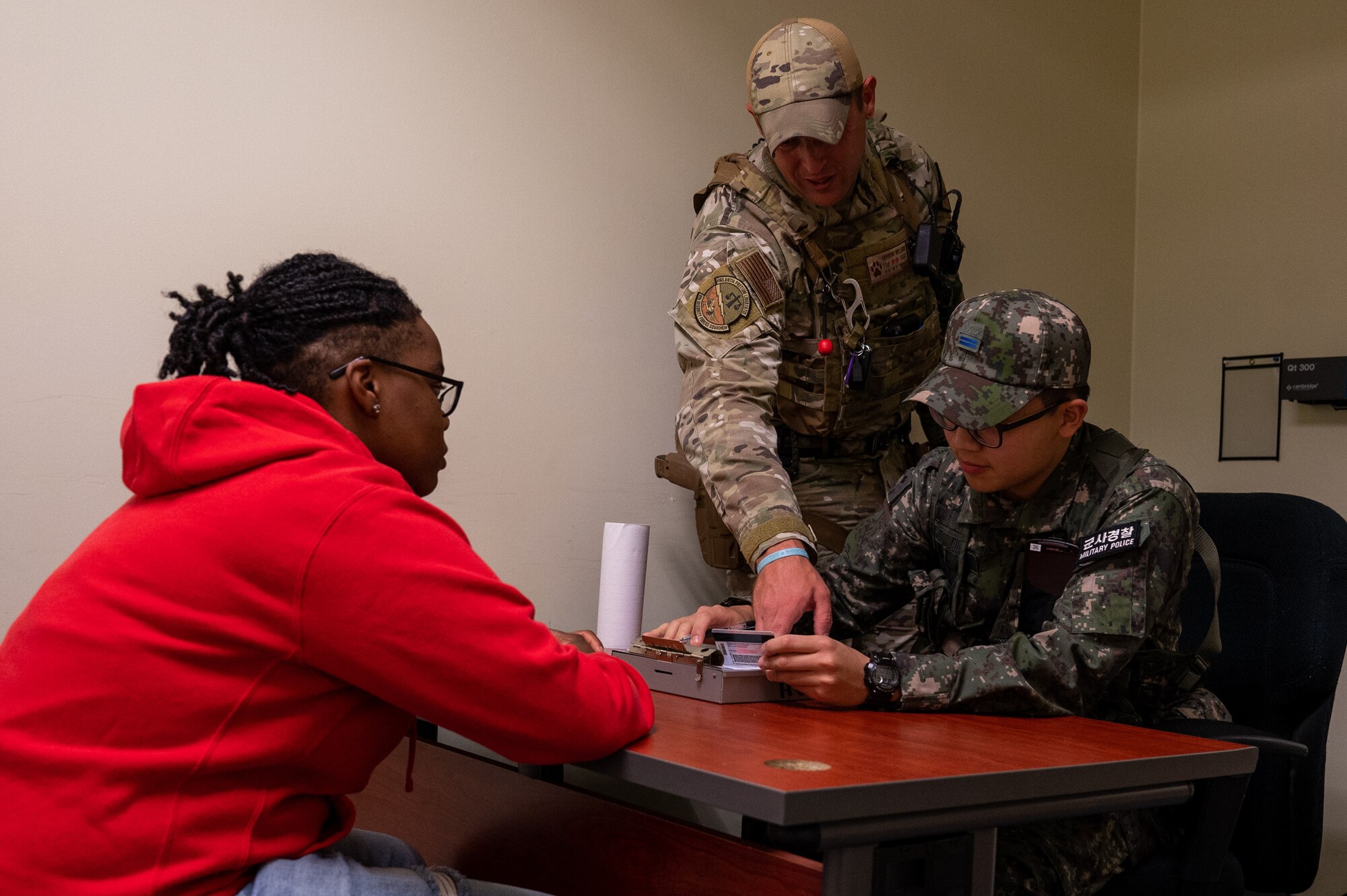 U.S. Air Force Staff Sgt. William Herron and Republic of Korea Air Force Airmen 1st Class Huiseop Lin train techniques, tactics and procedures in preparation for the first-ever combined security patrols.