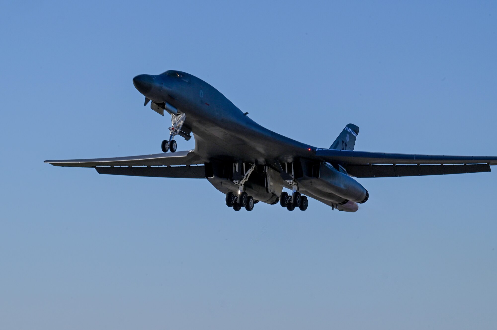A B-1B Lancer takes off from Dyess Air Force Base, Texas, Oct. 11, 2023, to kick off a U.S. European Command Bomber Task Force deployment. Given the inherent speed, flexibility, and range of strategic bombers, Bomber Task Force missions highlight U.S. capabilities to work closely with our allies and partners to any potential adversary. (U.S. Air Force photo by Senior Airman Sophia Robello)