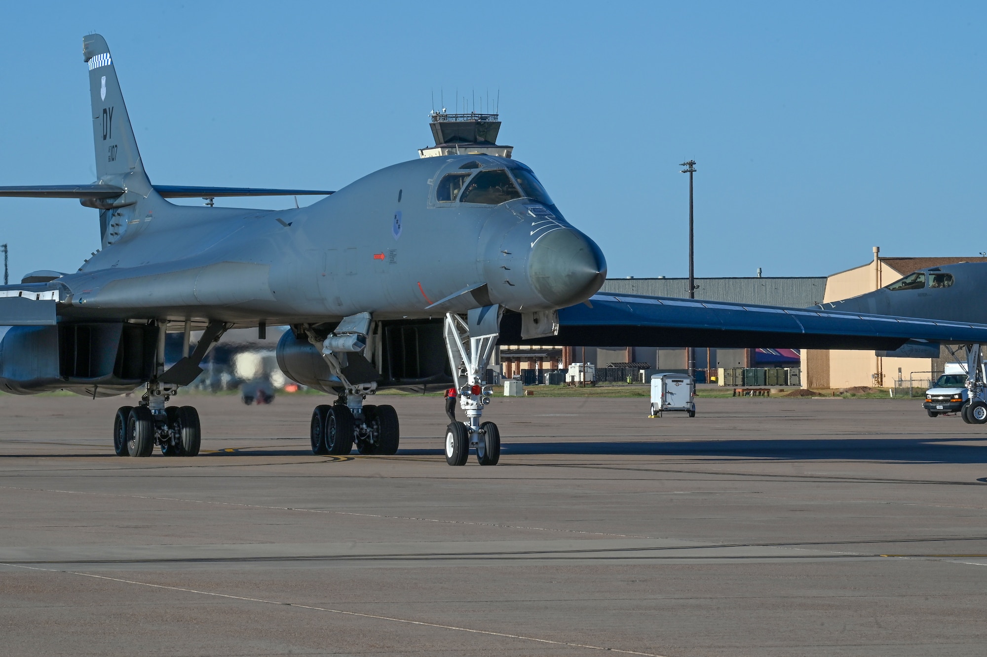 A B-1B Lancer taxis on the flightline at Dyess Air Force Base, Texas, Oct. 11, 2023, to kick off a U.S. European Command Bomber Task Force deployment. The bombers will support a top Department of Defense priority, demonstrating strategic reach anywhere in the world at any time. (U.S. Air Force photo by Senior Airman Sophia Robello)