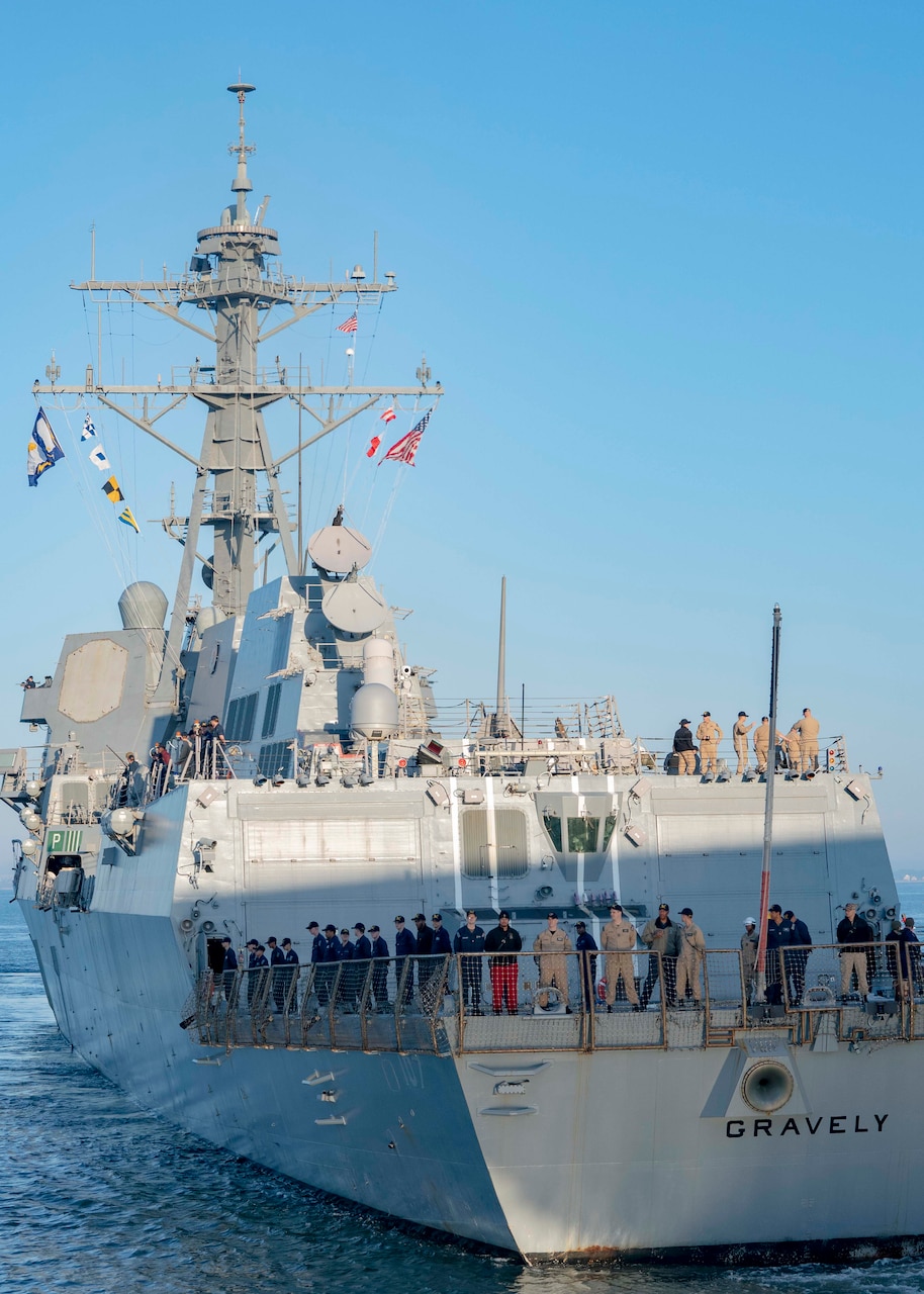 NORFOLK, Va. -  The Arleigh Burke-class guided-missile destroyer USS Gravely (DDG 107) departs Naval Station Norfolk for a scheduled deployment, Oct. 13, 2023. Gravely is deploying as part of the Dwight D. Eisenhower Carrier Strike Group. (U.S. Navy photo by Mass Communication Specialist 1st Class Ryan Seelbach)