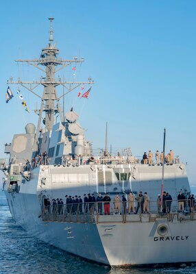 NORFOLK, Va. -  The Arleigh Burke-class guided-missile destroyer USS Gravely (DDG 107) departs Naval Station Norfolk for a scheduled deployment, Oct. 13, 2023. Gravely is deploying as part of the Dwight D. Eisenhower Carrier Strike Group. (U.S. Navy photo by Mass Communication Specialist 1st Class Ryan Seelbach)