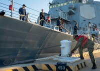 NORFOLK, Va. -  The Arleigh Burke-class guided-missile destroyer USS Gravely (DDG 107) departs Naval Station Norfolk for a scheduled deployment, Oct. 13, 2023. Gravely is deploying as part of the Dwight D. Eisenhower Carrier Strike Group. (U.S. Navy photo by Mass Communication Specialist 1st Class Ryan Seelbach)