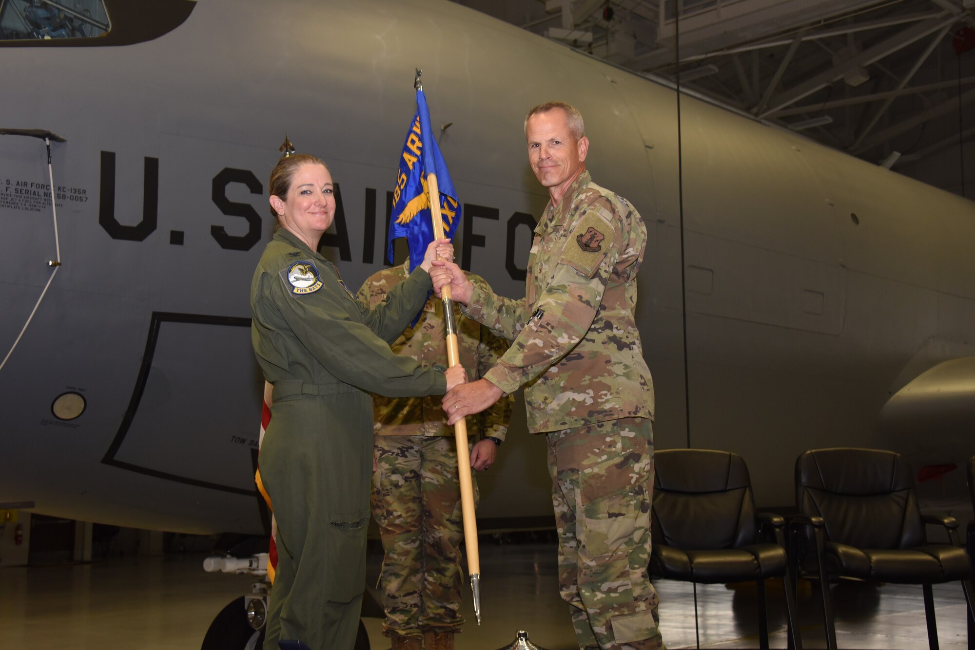 U.S. Air National Guard Col. Trenton Twedt accepts the 185th Air Refueling Wing guidon as he assumes command of the unit’s Maintenace Group in Sioux City, Iowa, Oct. 14, 2023.