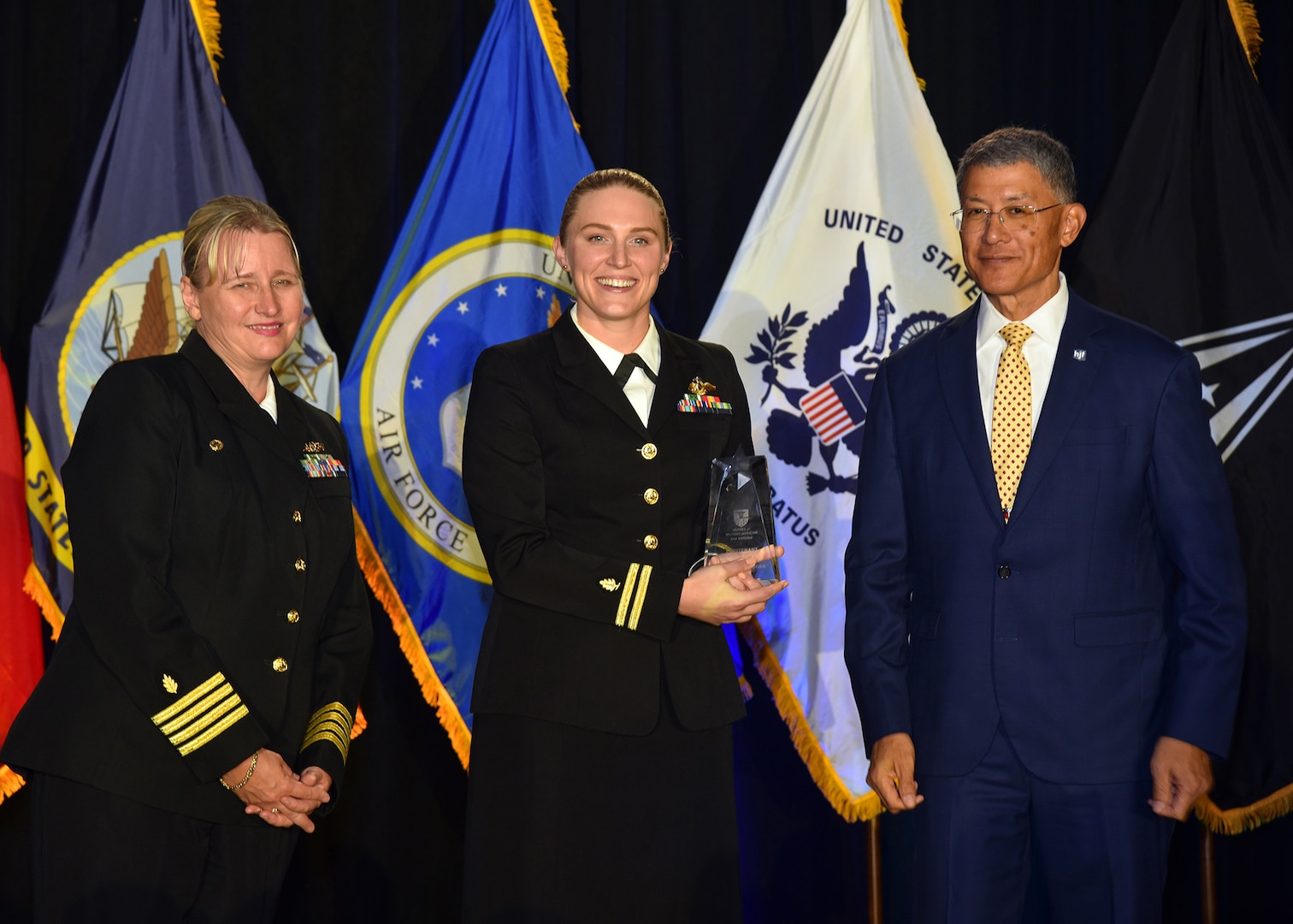 SAN ANTONIO – (Oct. 12, 2023) – Lt. Rachel Robeck, of Atlanta, a Navy Emergency Medicine physician assistant assigned to Naval Medical Research Unit (NAMRU) San Antonio, was recognized as a Hero of Military Medicine honoree during the 2023 Heroes of Military Medicine San Antonio Awards Program held at The Red Berry Estate. Presenting the award was retired U.S. Army Maj. Gen. Joseph Caravalho, president and CEO of the Henry M. Jackson Foundation (HJF) for the Advancement of Military Medicine, Inc., joined by NAMRU Commanding Officer Capt. Jennifer Buechel. The awards program, hosted by the HJF, recognized exception community leaders who advance military medicine in and around the greater San Antonio area. The event brought the story of Military City USA’s unique military and civilian medical research and clinical care collaborations to national and global attention. NAMRU San Antonio’s mission is to conduct gap driven combat casualty care, craniofacial, and directed energy research to improve survival, operational readiness, and safety of Department of Defense (DoD) personnel engaged in routine and expeditionary operations. It is one of the leading research and development laboratories for the U.S. Navy under the DoD and is one of eight subordinate research commands in the global network of laboratories operating under the Naval Medical Research Command in Silver Spring, Md. (U.S. Navy photo by Burrell Parmer, NAMRU San Antonio Public Affairs/Released)