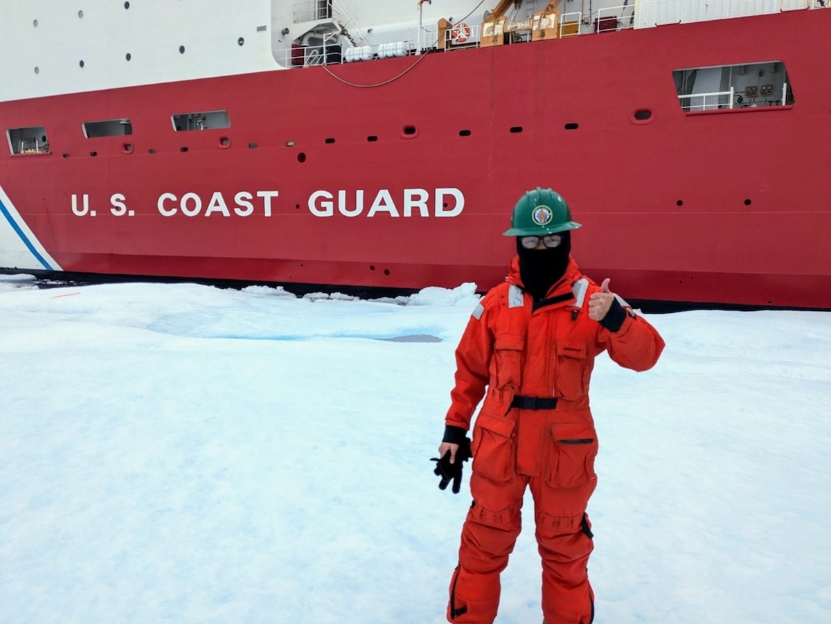 U.S. Space Force Capt. Henry Cho poses in front of the U.S. Coast Guard Cutter Healy (WAGB-20), Aug.6, 2023, in the Arctic region. Cho is the first USSF Guardian to receive the Arctic Service Medal by serving 21 days in the Arctic. (Courtesy photo)