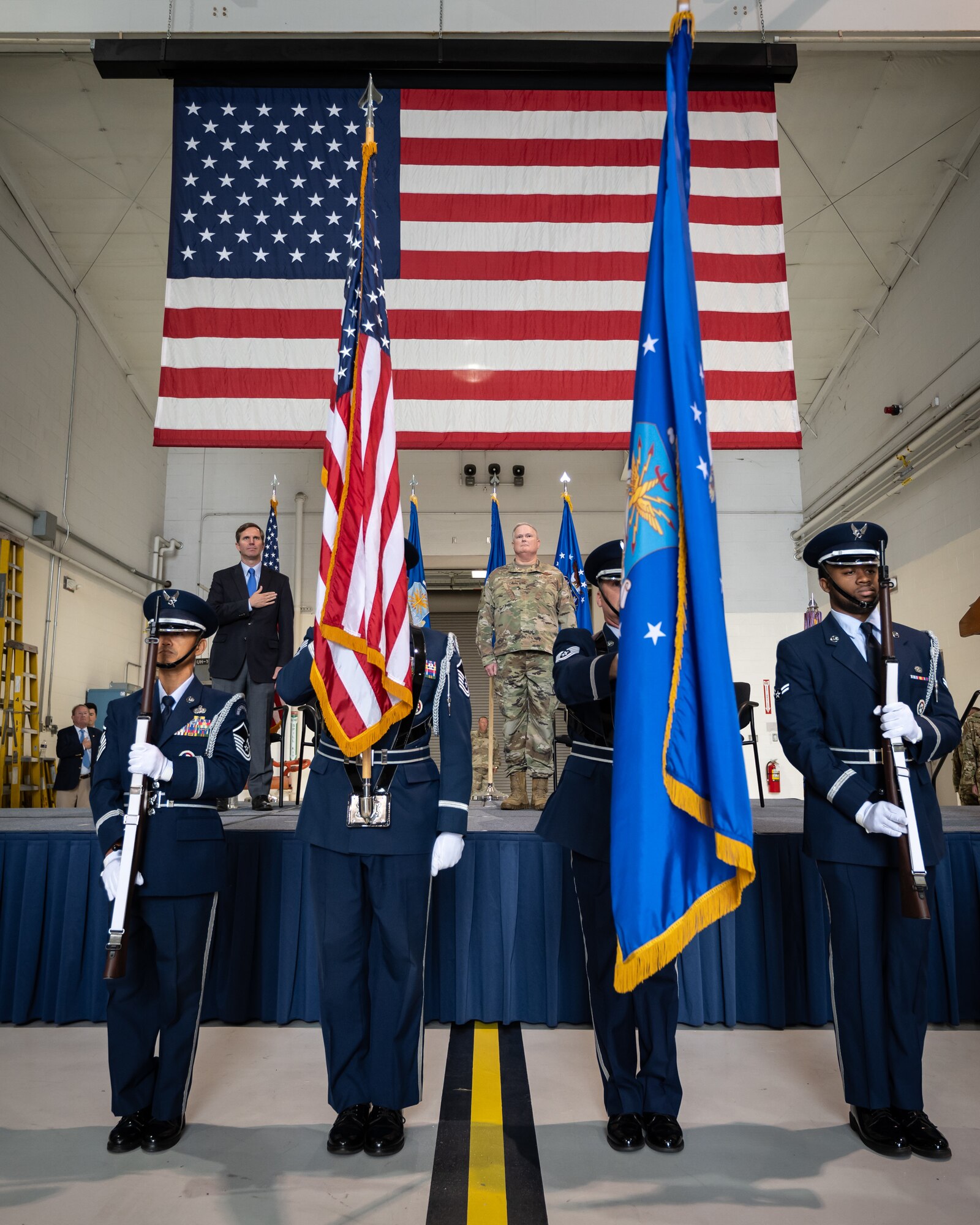 Airmen present the colors during an award ceremony at the Kentucky Air National Guard Base in Louisville, Ky., Oct. 14, 2023. The 123rd Airlift Wing received its 20th Air Force Outstanding Unit Award and a Meritorious Unit Award for superior achievement in a broad spectrum of missions around the world since 2019. (U.S. Air National Guard photo by Dale Greer)