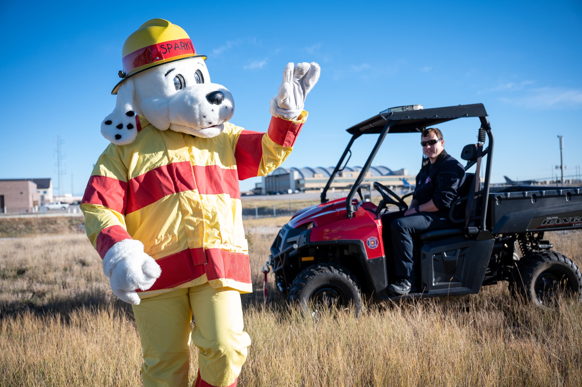 Sparky the Fire Dog waving