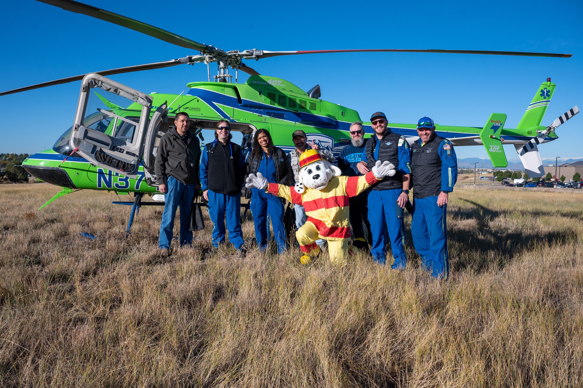 a group photo with Sparky the Fire Dog.
