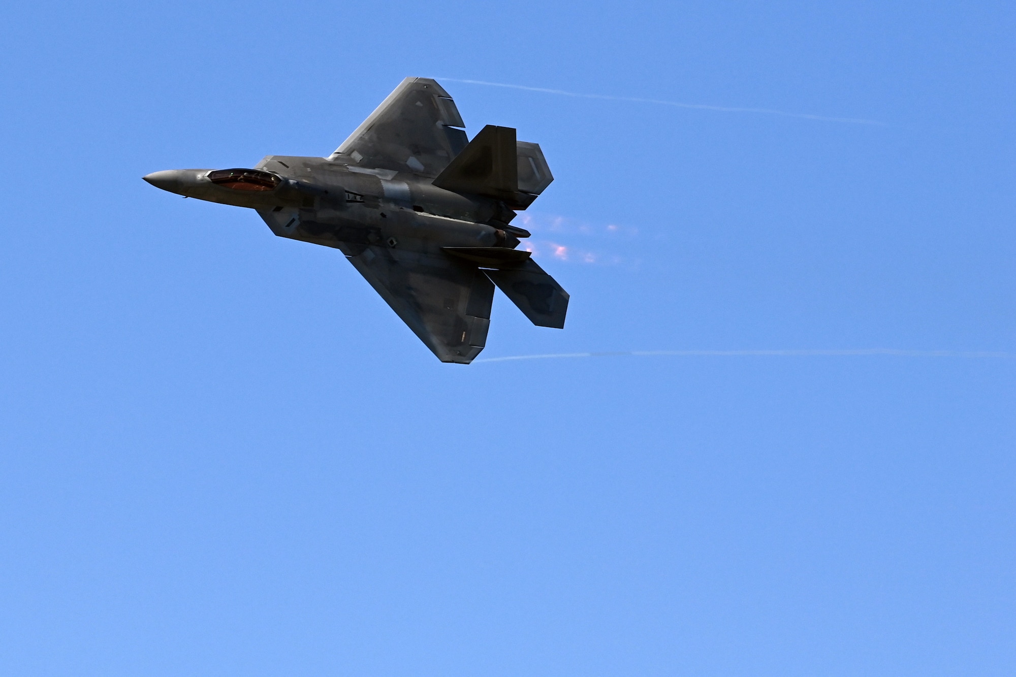 A U.S. Air Force F-22 Raptor performs maneuvers during a demonstration at the 2023 Seoul International Aerospace and Defense Exhibition media day at Seoul Air Base, Republic of Korea, Oct. 16, 2023.