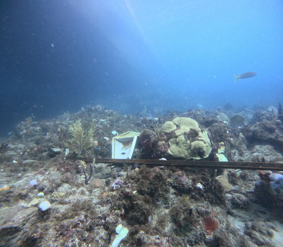Debris found by National Oceanic and Atmospheric Administration divers while conducting a marine and coral assessment on the ocean floor around the Bonnie G off Cyril E. King Airport, St. Thomas, Oct. 14, 2023. NOAA experts determined salvage operations are not impacting coral in the area. (NOAA photo by Sean Griffin)
