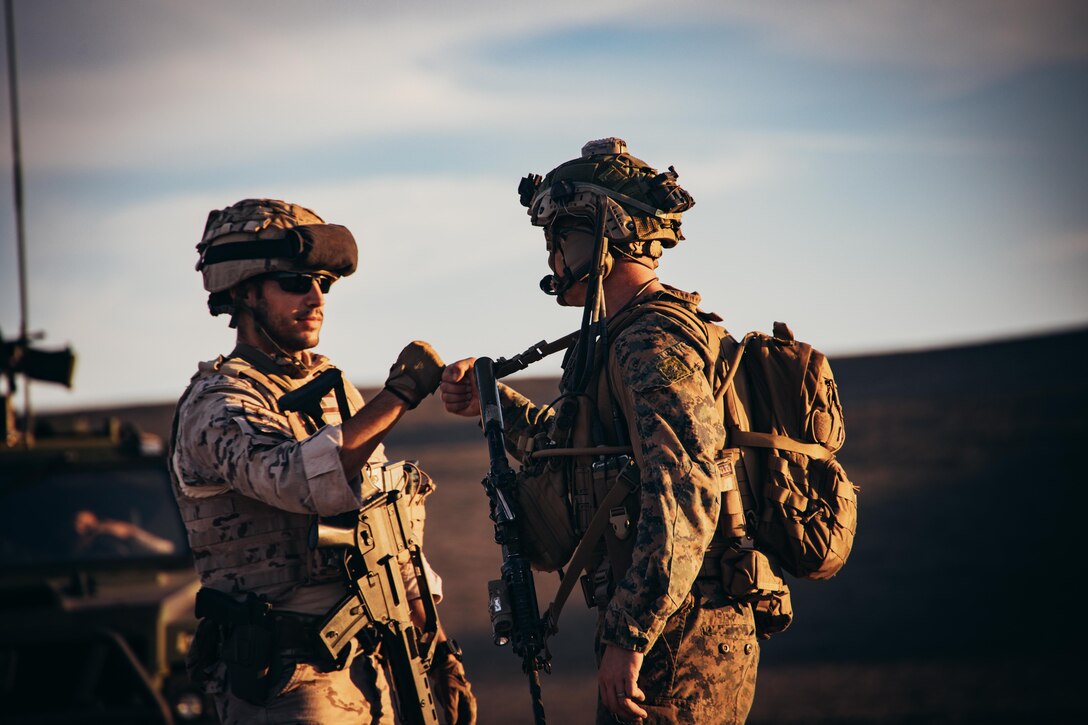 U.S. Marine Corps Maj. Adam White, 26th Marine Expeditionary Unit, Battalion Landing Team 1/6 Charlie Company Commander, discusses tactics with a Spanish Armed forces member during an integrated, multilateral amphibious assault as part of a Spanish bilateral exercise, Rota, Spain, Oct. 2, 2023. The San Antonio-class amphibious ship USS Mesa Verde (LPD 19), assigned to the Bataan Amphibious Ready Group and embarked 26th Marine Expeditionary Unit (Special Operations Command), under the command and control of Task Force 61/2, is on a scheduled deployment in the U.S. Naval Forces Europe area of operations, employed by U.S. Sixth Fleet to defend U.S., Allied, and partner interests. (U.S. Marine Corps photo by Cpl. Aziza Kamuhanda)