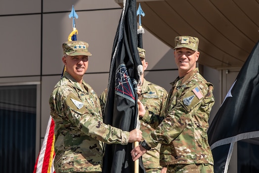  United States Space Force (USSF) Lieutenant General Stephen Whiting activated a new PNT Delta. USSF Colonel Andrew Menschner assumed command of the new delta. The ceremony also consisted of a patching moment where the members of the new delta applied their new patches to their uniforms. (U.S. Space Force Photo by Dalton Prejeant)