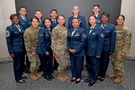 Members of the 433rd Airlift Wing stand for a photograph after participating in an NCO Induction Ceremony October 15, 2023, hosted by the Rising Six Council at Joint Base San Antonio-Lackland, Texas. (U.S. Air Force photo by Master Sgt. Samantha Mathison)