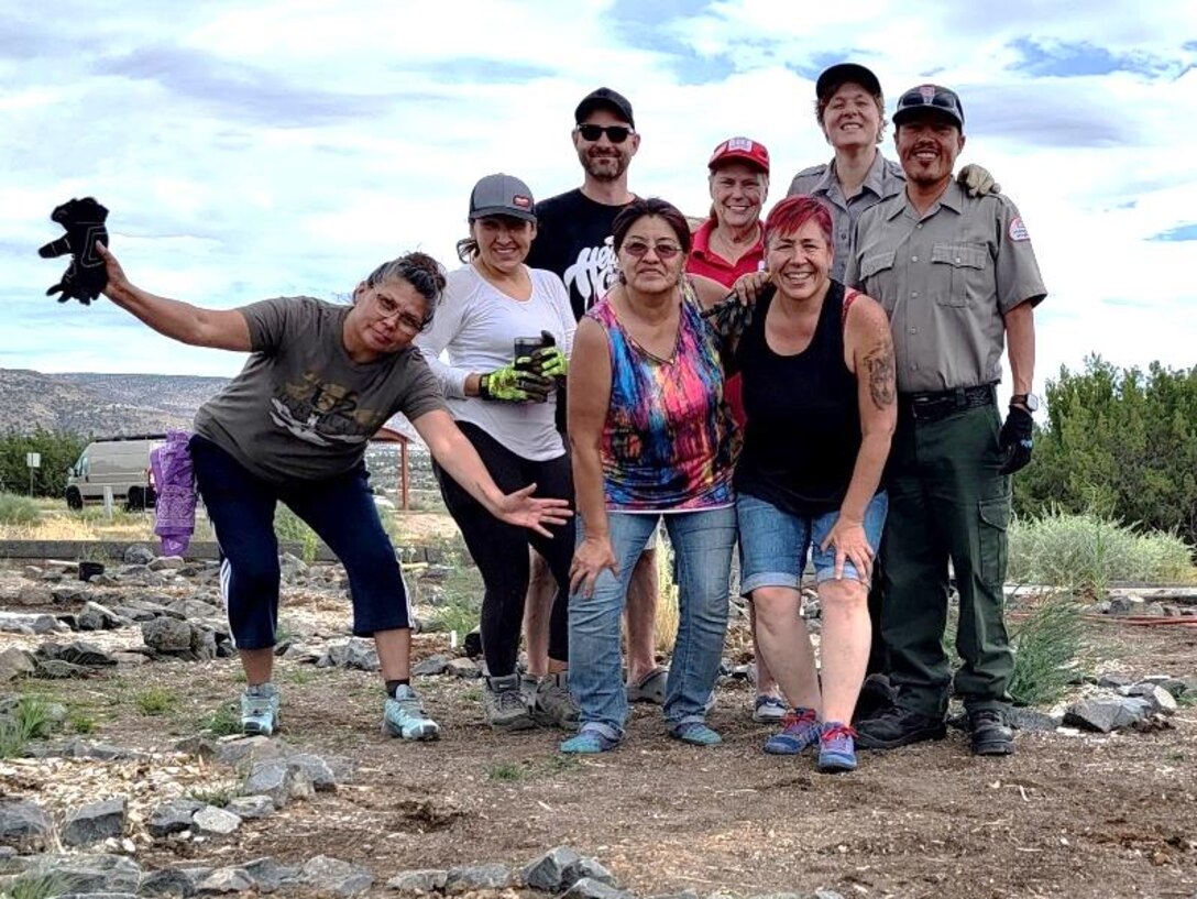 Volunteers and park rangers who participated in the “Planting for Pollinators” event pose for a group photo after the event at Cochiti Lake, Sept. 23, 2023.