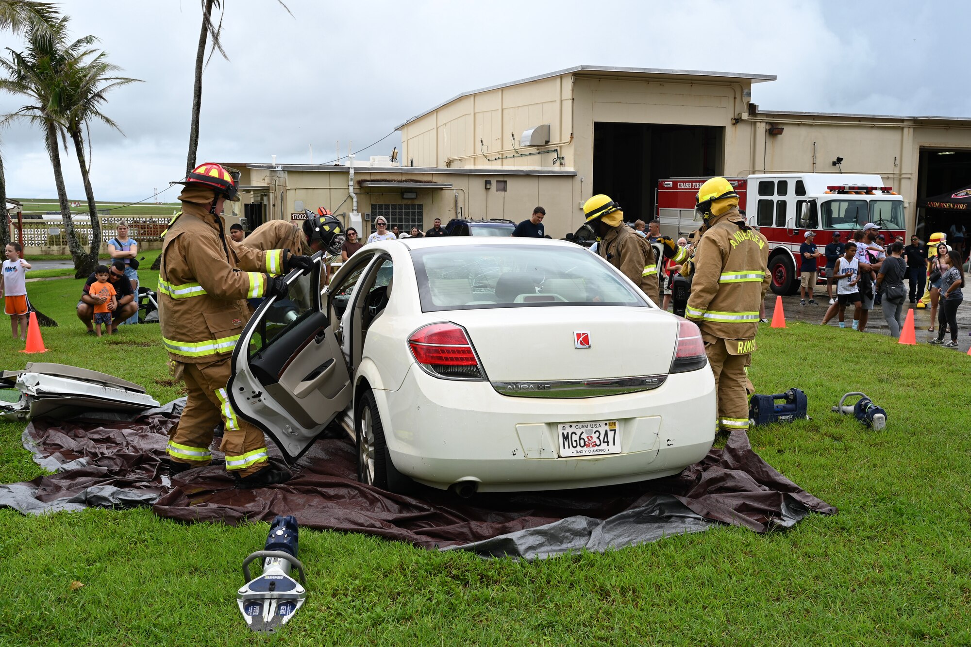 36th Civil Engineer Squadron firefighters take apart a vehicle