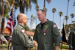Commander, Naval Air Force Reserve Rear Adm. Brad Dunham (left) shakes the hand of outgoing Commodore, Maritime Support Wing (MSW) Capt. Edward Hoak (right) during the MSW Change of Command Ceremony in the courtyard of the I-Bar on Naval Base Coronado, Sept. 21.