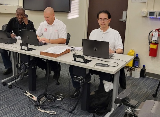 Left to right: Miner Holloway Pacific Ocean Division Planner; Jordan Melvin LPRT 
member from Albuquerque District; and Boonchan “Mike” Pornnang LPRT member from San Francisco District provide logistics support in Maui.