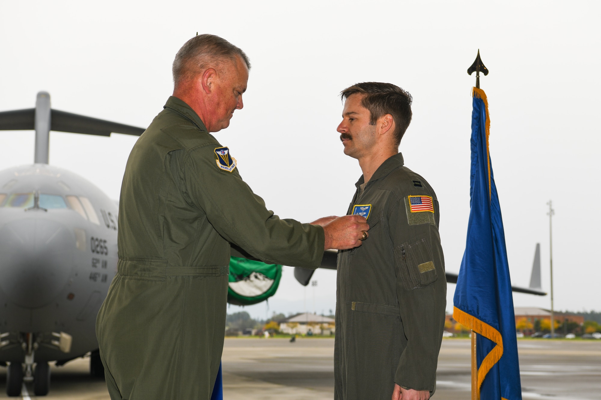 A medal pinning during a ceremony