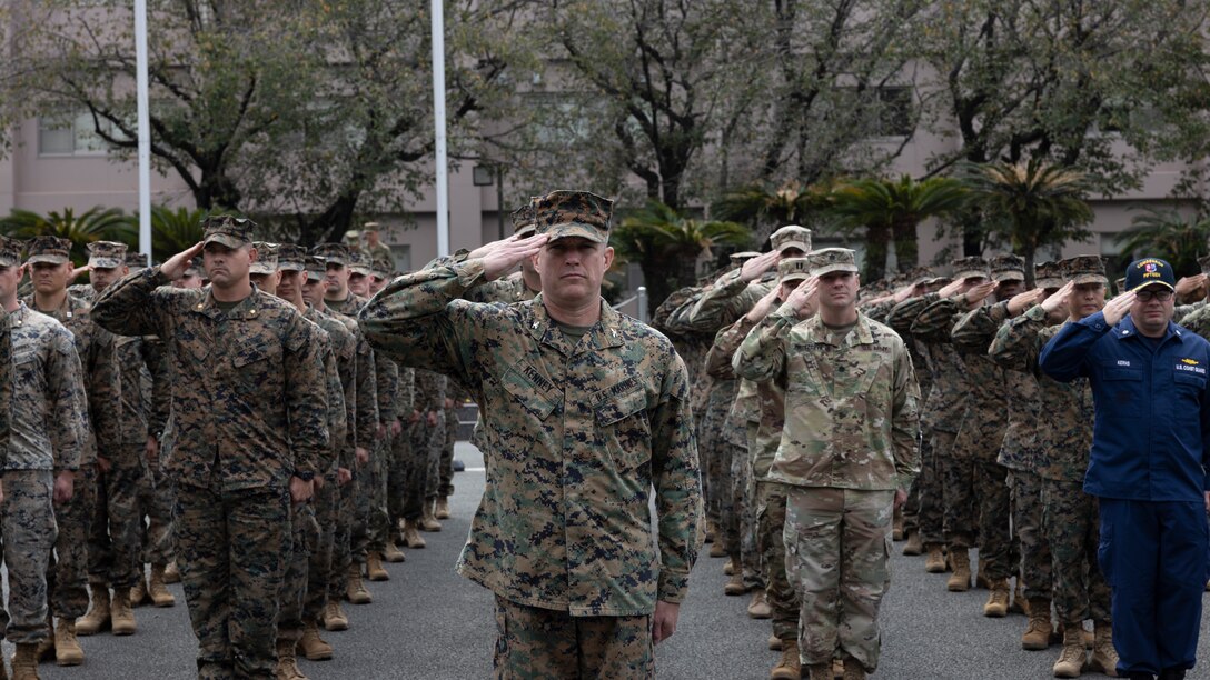 Members of the U.S. Armed Forces salute during the opening ceremony for the field training exercise portion of Resolute Dragon 23 held at Camp Kengun, Kumamoto, Japan, Oct. 14, 2023. RD 23 is an annual bilateral exercise in Japan that strengthens the command, control, and multi-domain maneuver capabilities of Marines in III Marine Expeditionary Force and allied Japan Self-Defense Force personnel. (U.S. Marine Corps photo by Staff Sgt. Robert G. Gavaldon)