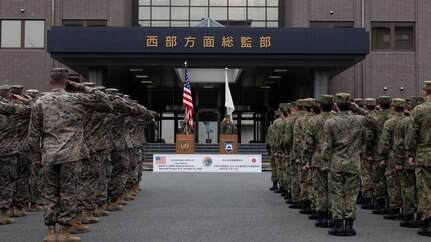 U.S. and Japanese national flags are presented during the opening ceremony for the field training exercise portion of Resolute Dragon 23 held at Camp Kengun, Kumamoto, Japan, Oct. 14, 2023.