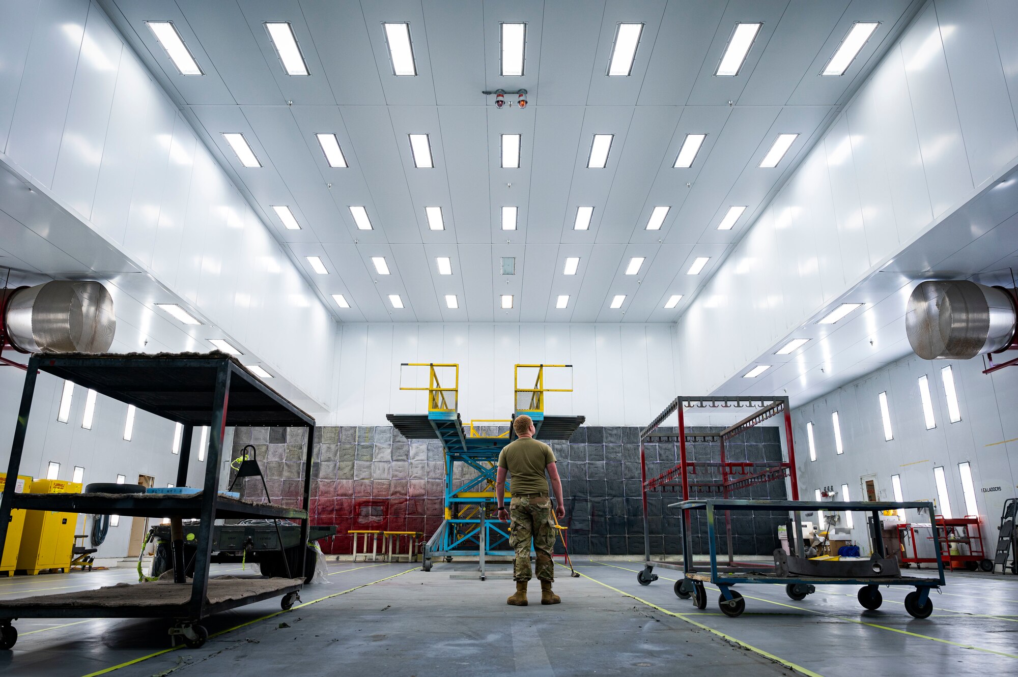 U.S. Air Force Senior Airman Justin Fail, 49th Equipment Maintenance Squadron aircraft structural maintenance journeyman, inspects a corrosion bay at Holloman Air Force Base, New Mexico, Oct. 2, 2023. The sheet metals shop at Holloman is responsible for the inspection and care for the framework of all the F-16 Vipers on base, ensuring each one is in pristine condition to fly. (U.S. Air Force photo by Airman 1st Class Isaiah Pedrazzini)