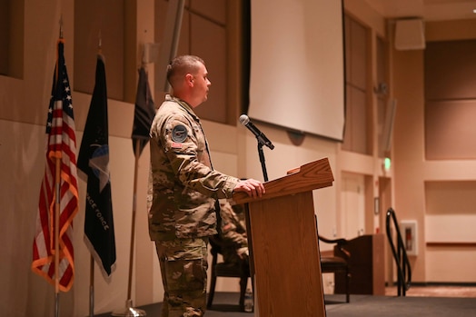  Military members hold guidon