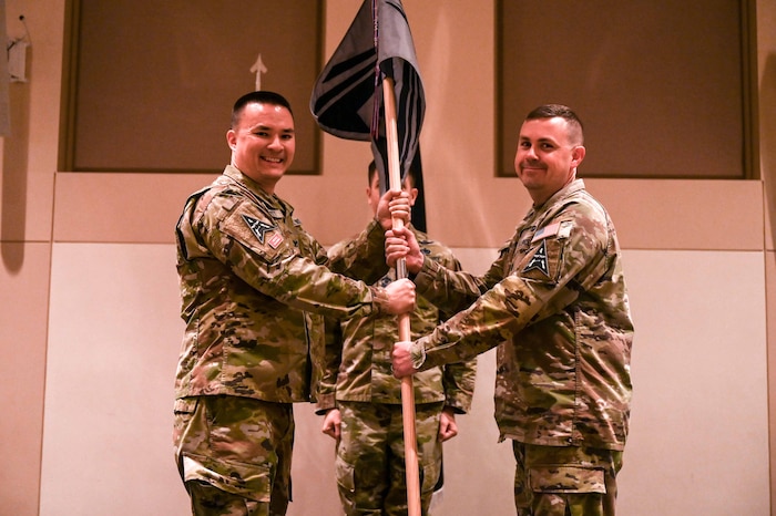 Man speaks at podium