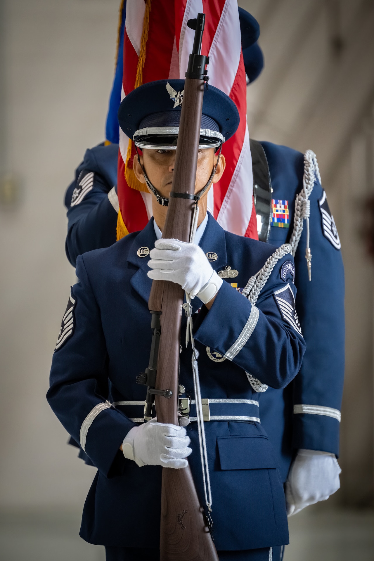 Airmen present the colors during an award ceremony at the Kentucky Air National Guard Base in Louisville, Ky., Oct. 14, 2023. The 123rd Airlift Wing received its 20th Air Force Outstanding Unit Award and a Meritorious Unit Award for superior achievement in a broad spectrum of missions around the world since 2019. (U.S. Air National Guard photo by Dale Greer)