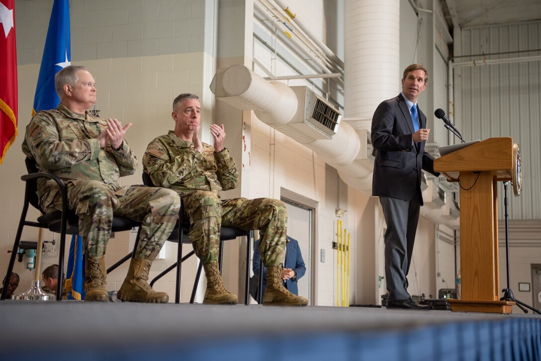 Kentucky Gov. Andy Beshear, right, speaks to members of the 123rd Airlift Wing during a ceremony at the Kentucky Air National Guard Base in Louisville, Ky., Oct. 14, 2023. The ceremony, which highlighted the unit’s accomplishments over the last four years, concluded with the presentation of the wing’s 20th Air Force Outstanding Unit Award. (U.S. Air National Guard photo by Tech. Sgt. Joshua Horton)