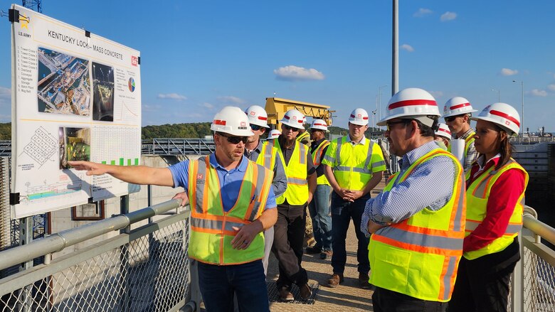 Mechanical Engineer Jody Robinson (Left) briefs Secretary of the Army for Civil Works Michael L. Connors on the mass placement of concrete at the Kentucky Lock Addition Project on the Tennessee River in Grand Rivers, Kentucky. (USACE Photo by Vanessa Rudd)