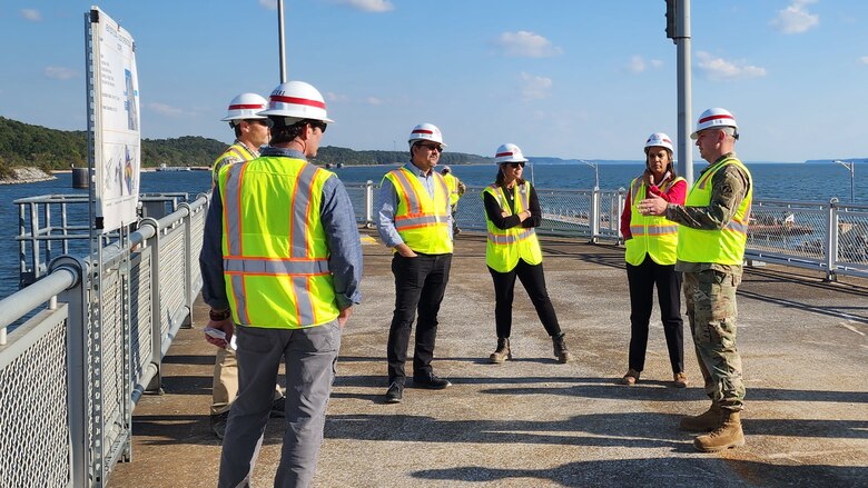 Lt. Col. Robert W. Green (Right), U.S. Army Corps of Engineers Nashville District commander, provides information about operations at Kentucky Lock to Secretary of the Army for Civil Works Michael L. Connors (Third from Left) during a tour of the project Oct. 12, 2023, on the Tennessee River in Grand Rivers, Kentucky. (USACE Photo by Vanessa Rudd)