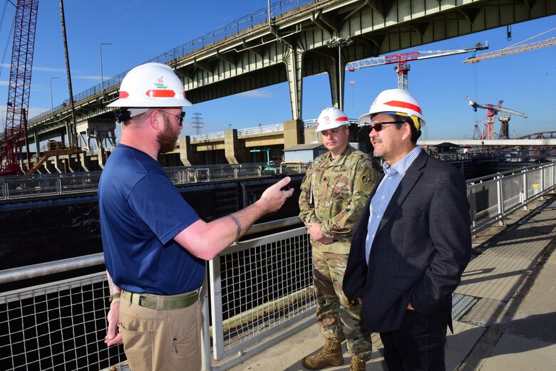 Lockmaster Cory Richardson (Left) interacts with Secretary of the Army for Civil Works Michael L. Connors and Lt. Col. Robert W. Green, U.S. Army Corps of Engineers Nashville District commander, during a tour Oct. 12, 2023, of the active Chickamauga Lock on the Tennessee River in Chattanooga, Tennessee. (USACE Photo by Lee Roberts)