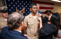 ACKSONVILLE, Fla. (Sept. 29, 2023) – Chief Master-at-Arms Joshua Abraham, assigned to Commander, Navy Region Southeast, receives his anchors during a Chief Petty Officer pinning ceremony aboard Naval Air Station Jacksonville, Sept. 29, 2023.