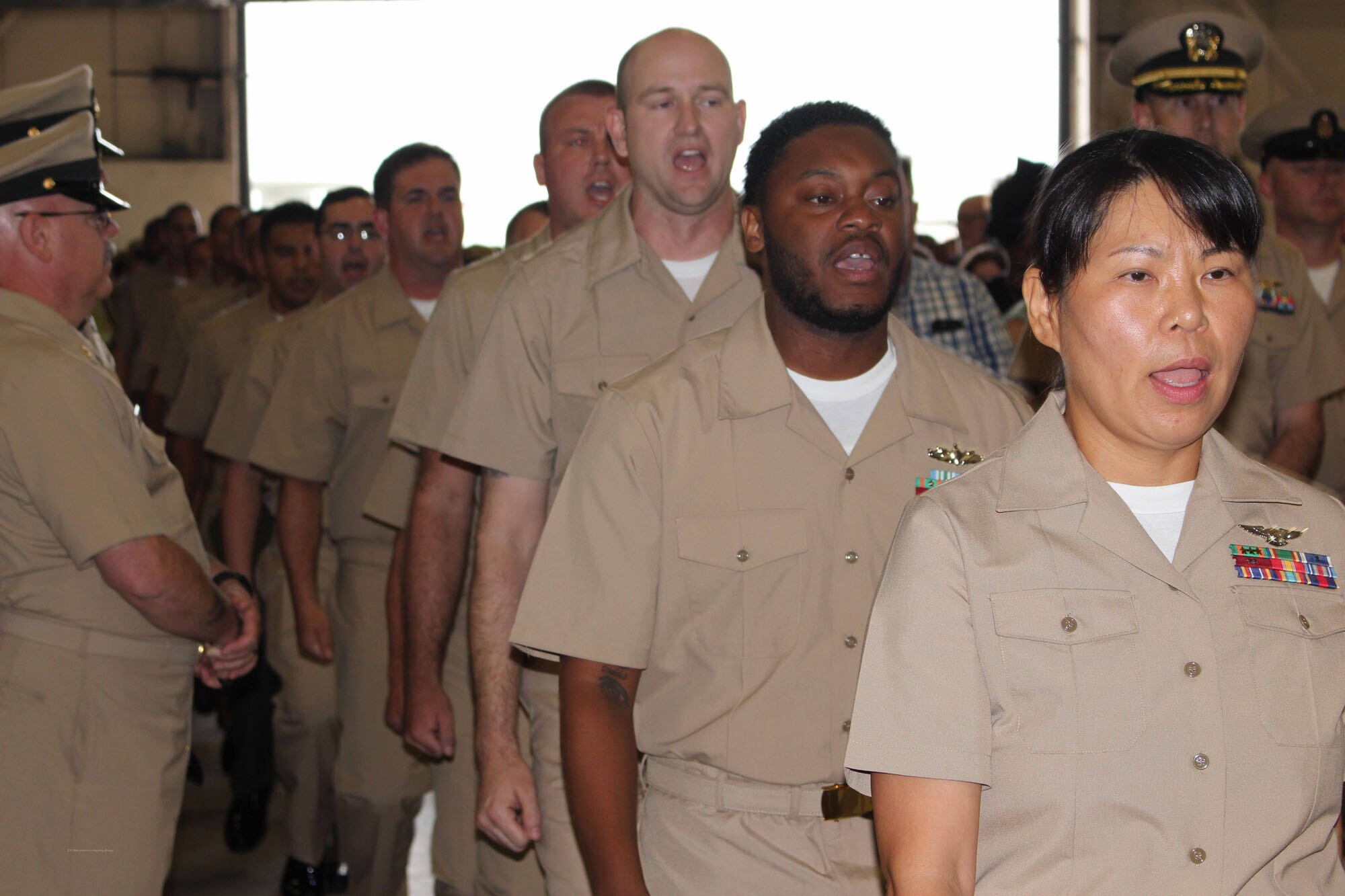 NIWC Atlantic joined forces with the Airborne Command & Control and Logistics Wing (ACCLOGWING) for the 2023 Navy Chief Petty Officer Pinning ceremony hosted by VAW-120 on Sept. 29 at 10:00am in LP-34 Hangar, Norfolk, VA. NIWC Atlantic's YNC Bilaal Porter, ITC Nick Mayer, LSC Matthew Hughes, ITC Jereyme Nova, and OSC Tonya Booker, along with 20 other ACCLOGWING CPO Selectees had their anchors pinned on and their caps donned during the traditional Navy ceremony.  NIWC Atlantic's GySgt Regino Rosales (USMC) also completed the precursor CPO season training and was recognized as an Honorary Navy Chief Petty Officer.