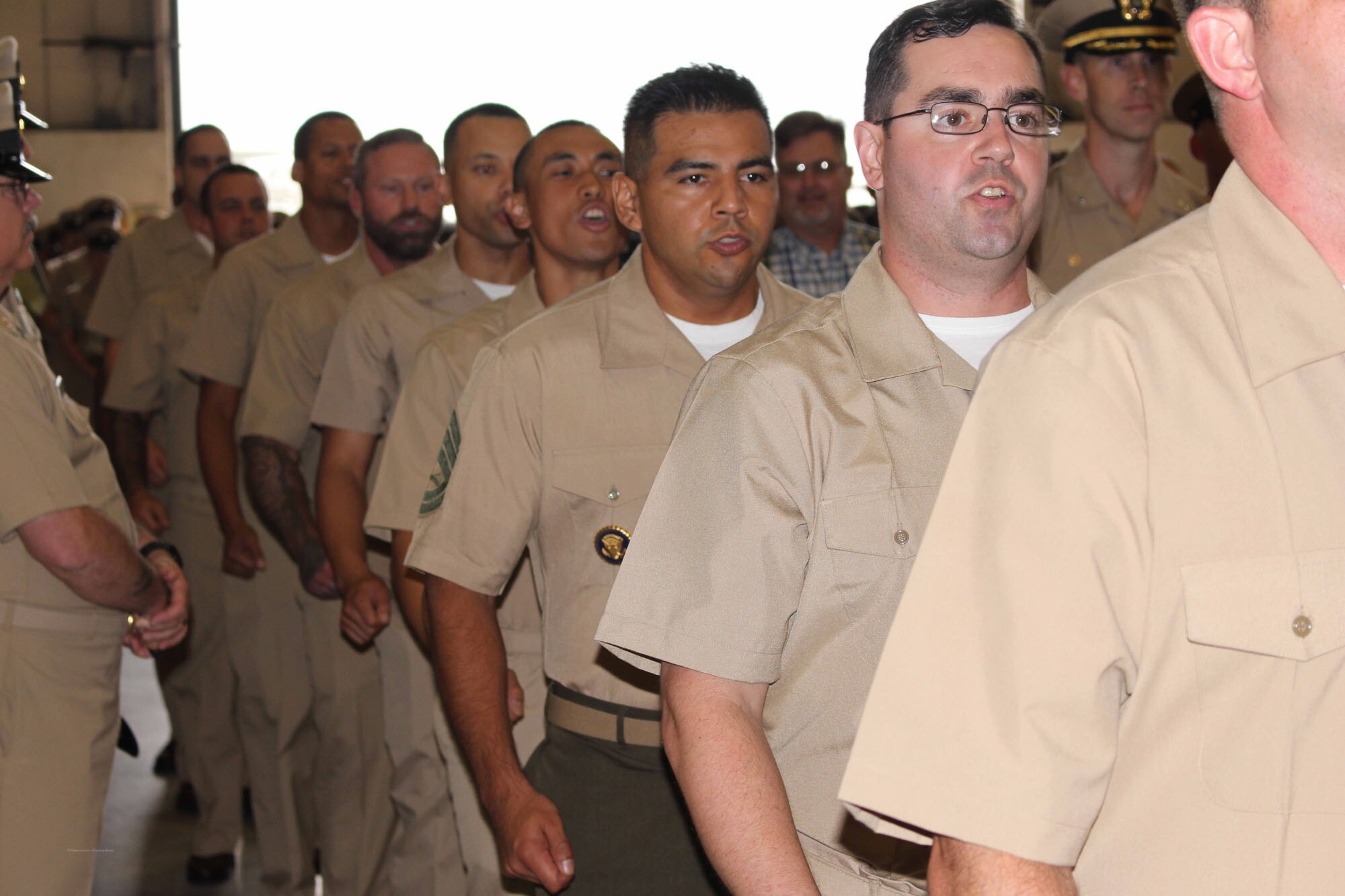NIWC Atlantic joined forces with the Airborne Command & Control and Logistics Wing (ACCLOGWING) for the 2023 Navy Chief Petty Officer Pinning ceremony hosted by VAW-120 on Sept. 29 at 10:00am in LP-34 Hangar, Norfolk, VA. NIWC Atlantic's YNC Bilaal Porter, ITC Nick Mayer, LSC Matthew Hughes, ITC Jereyme Nova, and OSC Tonya Booker, along with 20 other ACCLOGWING CPO Selectees had their anchors pinned on and their caps donned during the traditional Navy ceremony.  NIWC Atlantic's GySgt Regino Rosales (USMC) also completed the precursor CPO season training and was recognized as an Honorary Navy Chief Petty Officer.