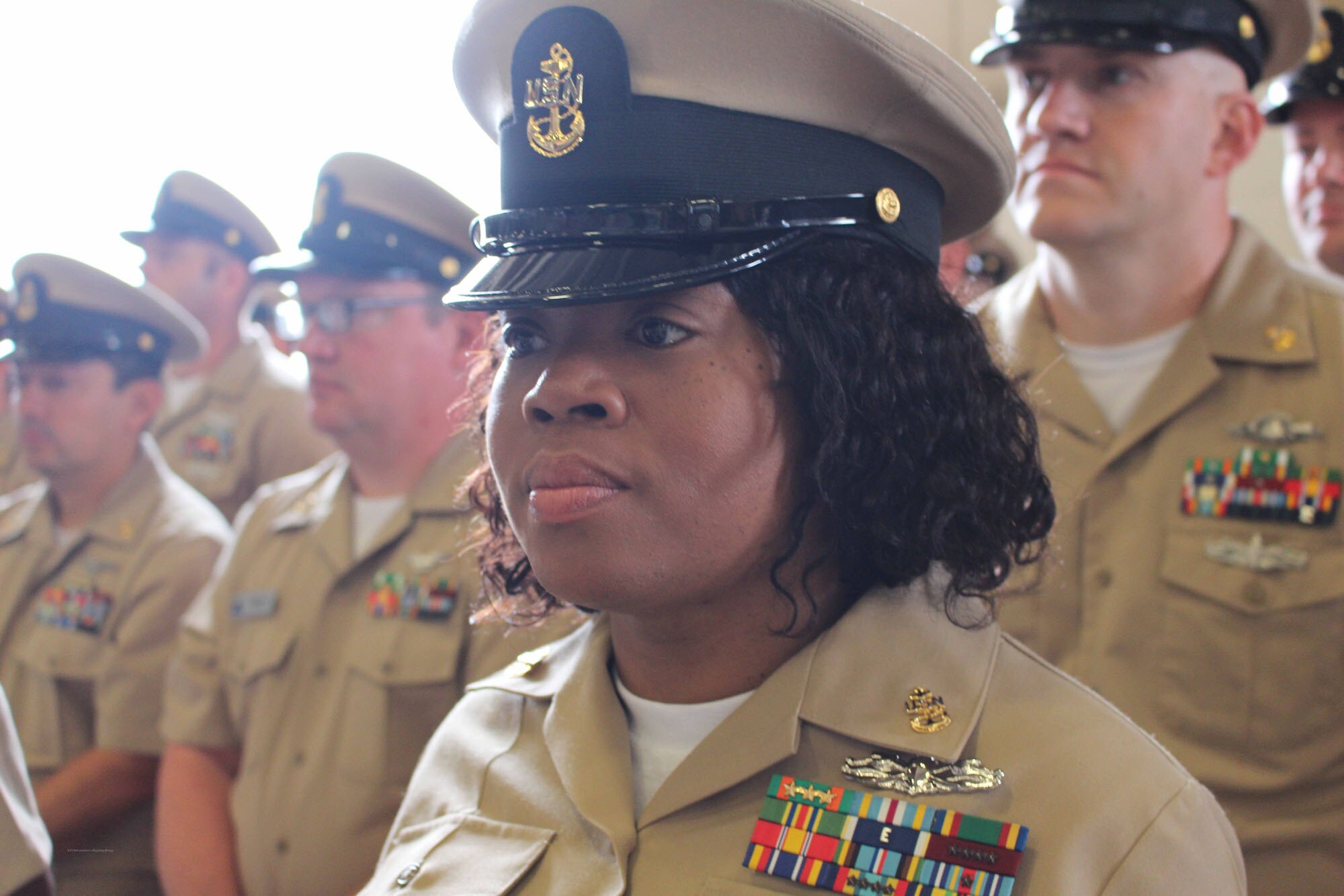 NIWC Atlantic joined forces with the Airborne Command & Control and Logistics Wing (ACCLOGWING) for the 2023 Navy Chief Petty Officer Pinning ceremony hosted by VAW-120 on Sept. 29 at 10:00am in LP-34 Hangar, Norfolk, VA. NIWC Atlantic's YNC Bilaal Porter, ITC Nick Mayer, LSC Matthew Hughes, ITC Jereyme Nova, and OSC Tonya Booker, along with 20 other ACCLOGWING CPO Selectees had their anchors pinned on and their caps donned during the traditional Navy ceremony.  NIWC Atlantic's GySgt Regino Rosales (USMC) also completed the precursor CPO season training and was recognized as an Honorary Navy Chief Petty Officer.