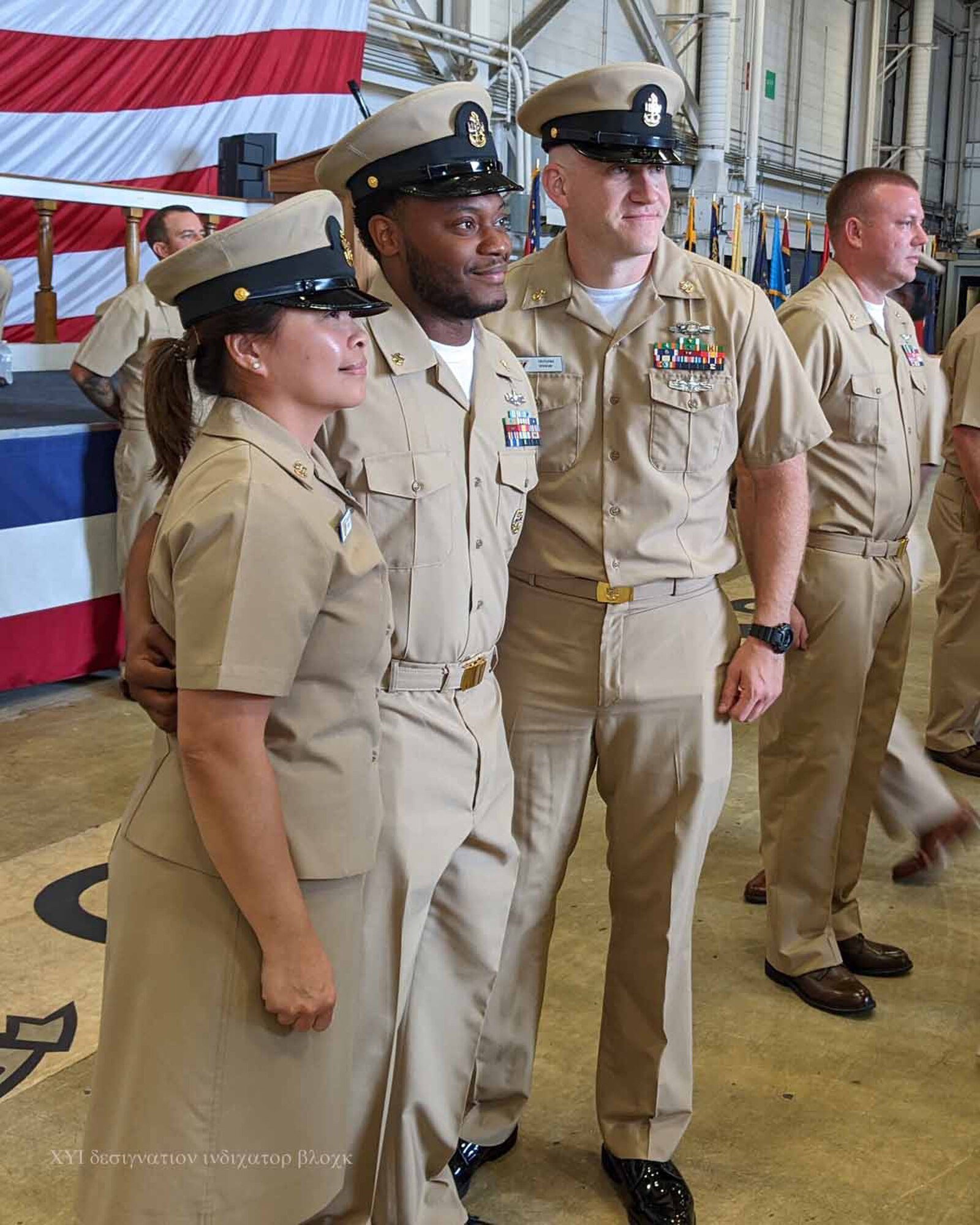 NIWC Atlantic joined forces with the Airborne Command & Control and Logistics Wing (ACCLOGWING) for the 2023 Navy Chief Petty Officer Pinning ceremony hosted by VAW-120 on Sept. 29 at 10:00am in LP-34 Hangar, Norfolk, VA. NIWC Atlantic's YNC Bilaal Porter, ITC Nick Mayer, LSC Matthew Hughes, ITC Jereyme Nova, and OSC Tonya Booker, along with 20 other ACCLOGWING CPO Selectees had their anchors pinned on and their caps donned during the traditional Navy ceremony.  NIWC Atlantic's GySgt Regino Rosales (USMC) also completed the precursor CPO season training and was recognized as an Honorary Navy Chief Petty Officer.