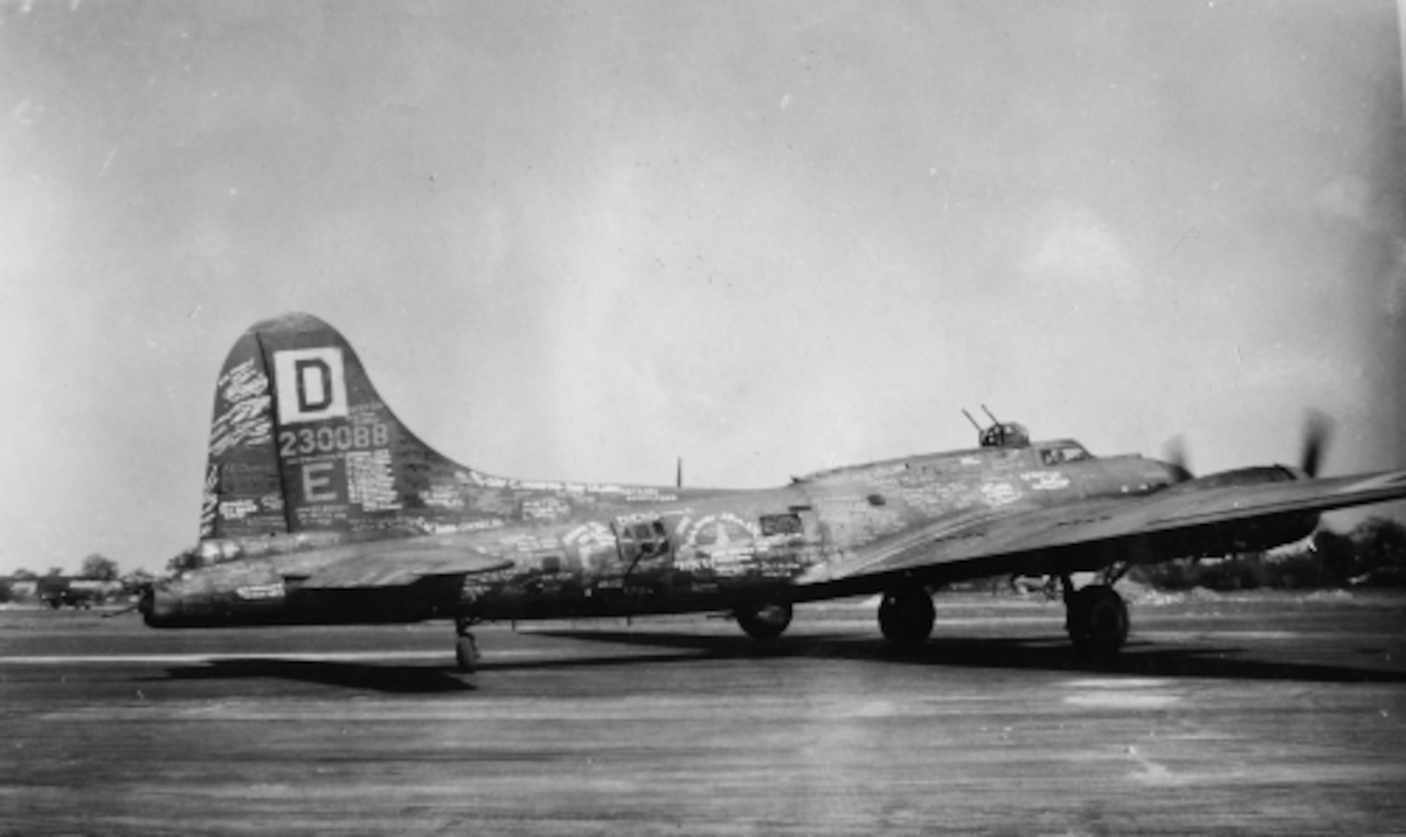 The original “Squawkin Hawk,” a B-17 Flying Fortress from World War II, was the first in the 100th Bomb Group to complete 50 combat missions. Built in Seattle, it was one of a 100-plane production block – a whole group of four-engine B-17 bombers manufactured to the set of design specifications between the end of March and beginning of April 1943. On Oct. 10, 2023, 80 years since the original first flew, the 100th Air Refueling Wing unveiled their latest heritage nose art, “Squawkin Hawk,” on one of KC-135 Stratotankers at Royal Air Force Mildenhall, England, with family members of the original World War II crew in attendance. (Courtesy photo from 100th Bomb Group Foundation archives and Elder family)